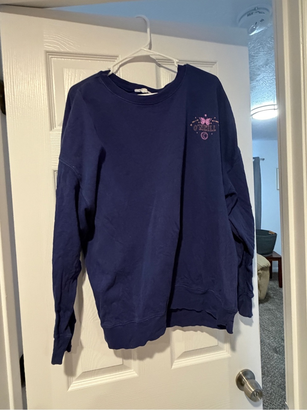 O'Neill Navy Crewneck Sweatshirt with Pink Logo Detail